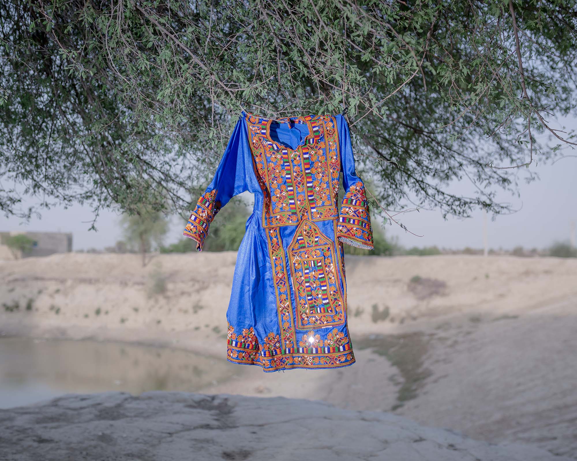 Jangarak , Iran, Sistan and Baluchestan, Majid Farahani, Majid Farahani Photography, Narrative photography, artistic collaboration, Visual narrative photography, Contemporary Iranian photography, Iranian photographer, Emotional Connection in Photography, Contemporary Iranian Photography, Visual Exploration of Personal Narratives, Storytelling through Portraits, Portrait Photography by Majid Farahani, Visual Storytelling in Photography, Narrative Photography Expert, Multidisciplinary Photography Artist, Storytelling through Portraits, Documentary Style Portraits, Visual Artist Focused on Human Stories, Lens-Based Art by Majid Farahani, Fusion of Fine Art and Documentary Photography, Visual Artist Exploring Human Narratives, Artistic Storytelling in Portraits, Personal and Shared Narratives, Documentary and Portrait Photography, village life in Iran, Iranian village lifestyle photography, storytelling photography, portrait photography, Portrait photography in Sistan and Baluchistan, Photography and human stories, Sistan and Baluchistan village life, social documentary photography, Needlework, Handmade wedding dresses, Traditional needlework, Needlework art, Cultural needlework,